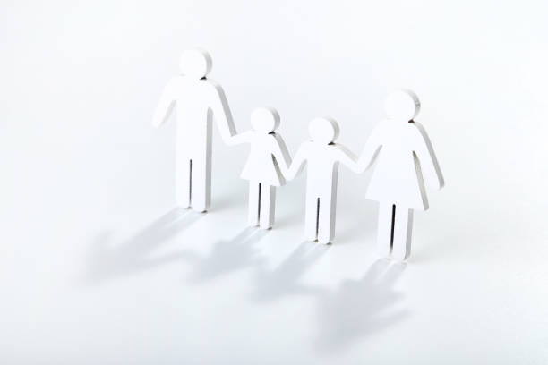 istock Family figures on gray background 1173284918