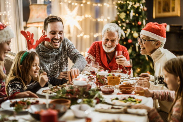 istock Family's New Year's Eve at dining table! 1173286630