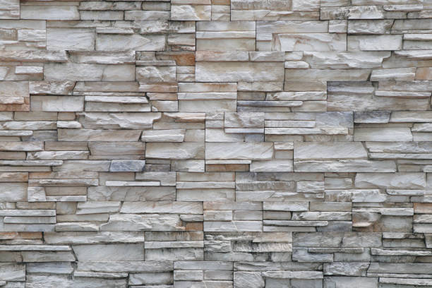 Stone background walls are stacked. Stone cladding background and wallpaper. Stone background walls are stacked. Stone cladding background and wallpaper. crag stock pictures, royalty-free photos & images