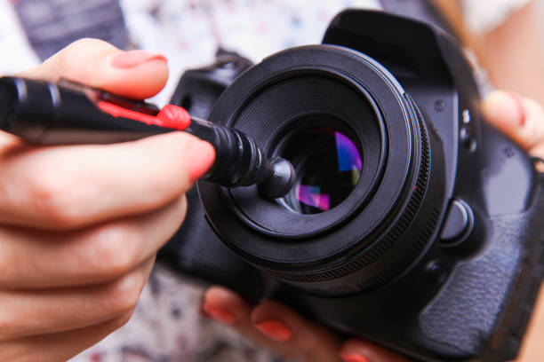 istock Girl photographer with reflex camera 1173294583