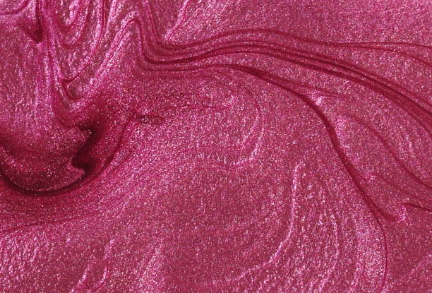 istock Abstract blured defocused pink color texture from nail polish. festive background . 1173294645