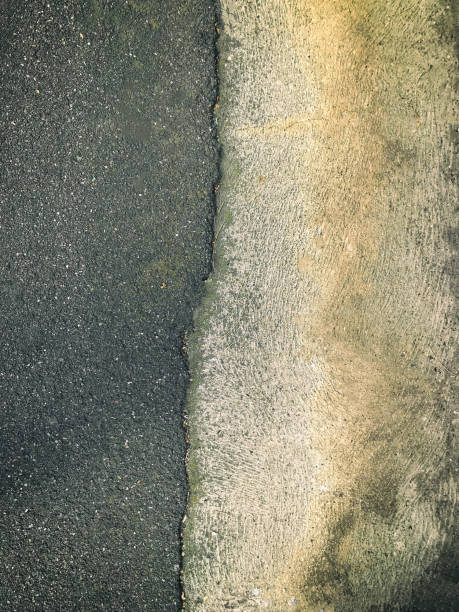 istock Dirty and weathered concrete background texture 1173297355