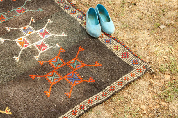 istock handmade rugs and nomadic shoes 1173297738