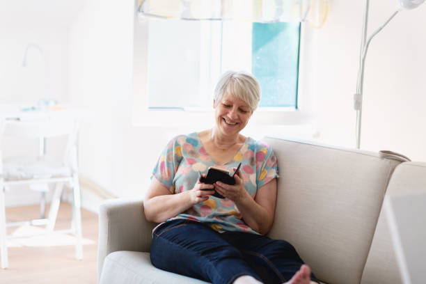 istock Senior woman text messaging 1173300269
