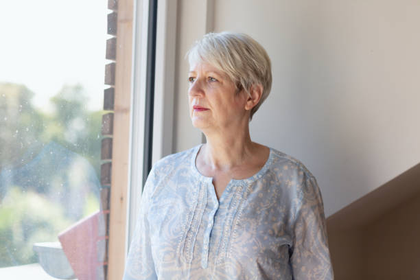 istock senior woman portrait 1173300318