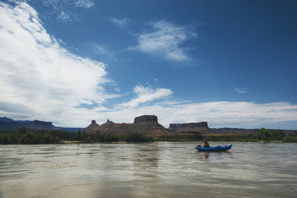 istock Woman rafting with kayak in Colorado river, Moab 1173301053