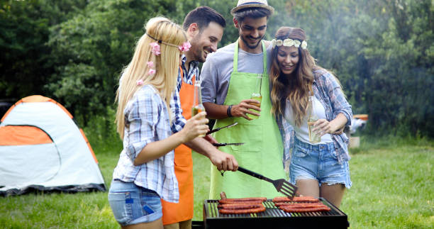 istock Friends spending time in nature and having barbecue 1173302855