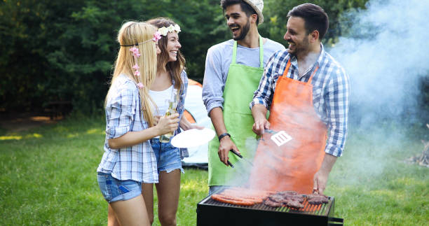 istock Friends spending time in nature and having barbecue 1173302996