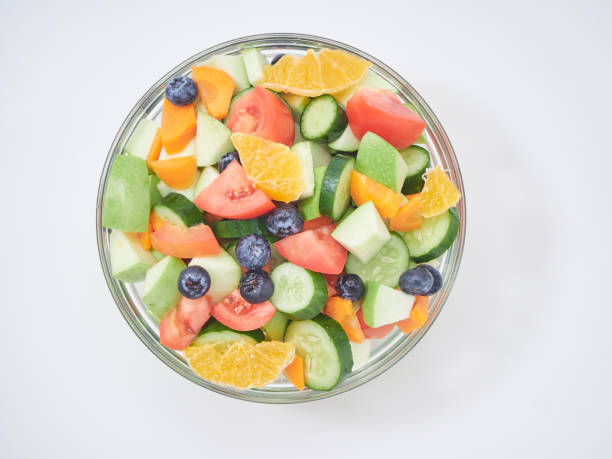 istock Mixed fruit and vegetable salad. Healthy breakfast menu. diet food 1173303005