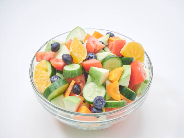 istock Mixed fruit and vegetable salad. Healthy breakfast menu. diet food 1173303006