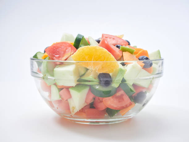 istock Mixed fruit and vegetable salad. Healthy breakfast menu. diet food 1173303029