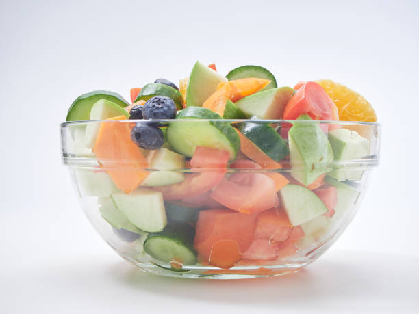 istock Mixed fruit and vegetable salad. Healthy breakfast menu. diet food 1173303039