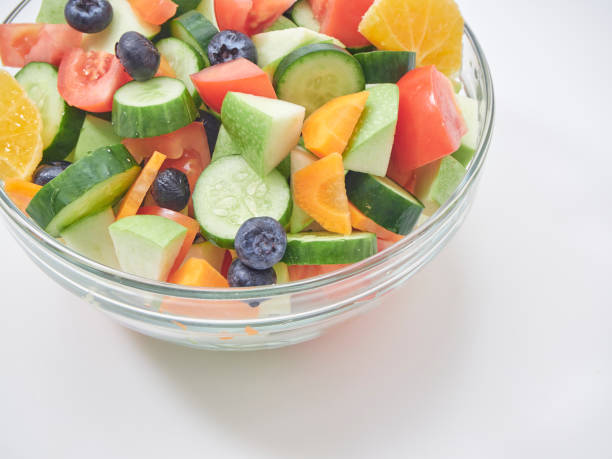 istock Mixed fruit and vegetable salad. Healthy breakfast menu. diet food 1173303044