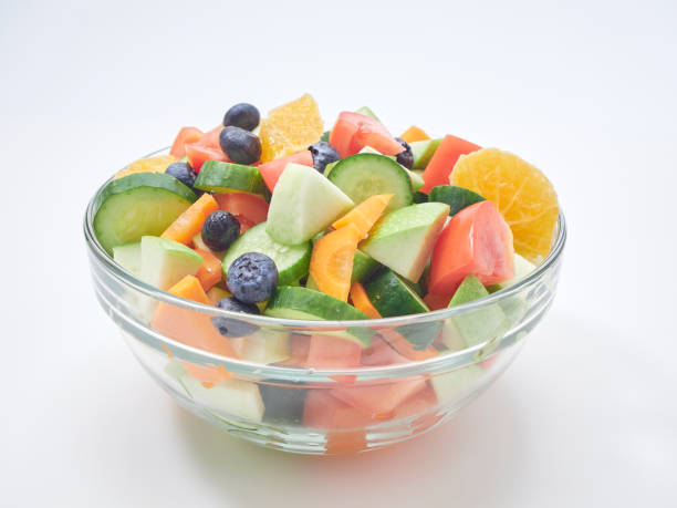 istock Mixed fruit and vegetable salad. Healthy breakfast menu. diet food 1173303067