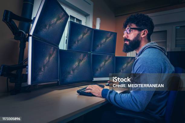 Astronomer In Control Panel Room Screen Stock Photo - Download Image Now - Multiple Screens, Astronomer, Satellite