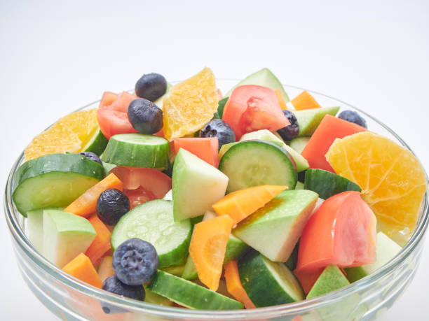 istock Mixed fruit and vegetable salad. Healthy breakfast menu. diet food 1173306463