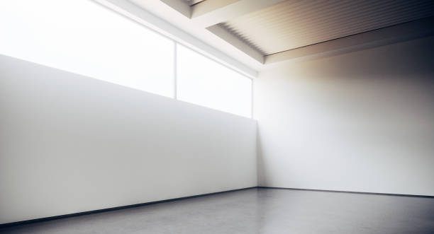 istock Empty loft style office building corridor with white concrete walls and floor. Concept of interior design and architecture. 3d rendering 1173306740