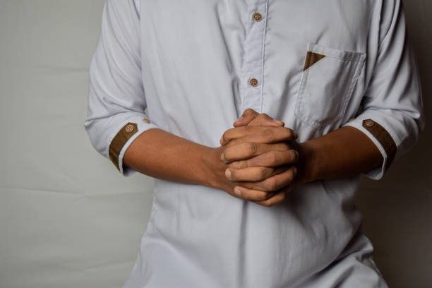 istock Close up Asian man shows hand gestures it means human emotion and expression isolated on white background 1173307009
