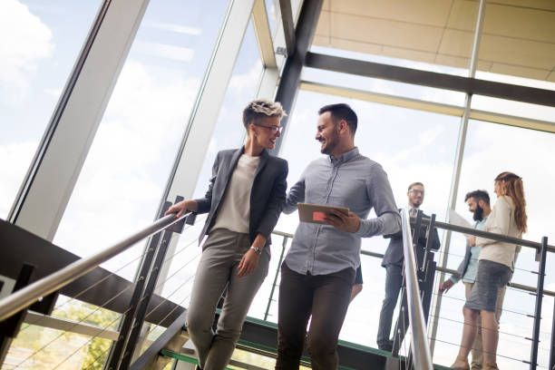 istock Business people having fun in modern office 1173317518