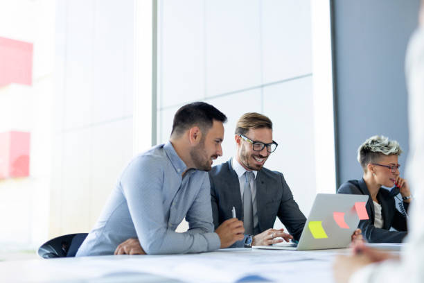 istock Group of business people collaborating in office 1173319015