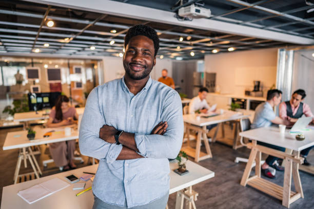 istock Handsome black gentleman in office 1173321271