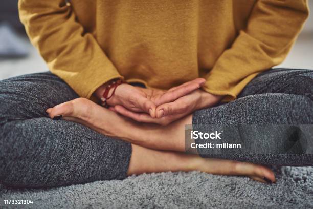 Close Up Of Caucasian Woman Meditating Indoors Stock Photo - Download Image Now - Meditating, Zen-like, Yoga