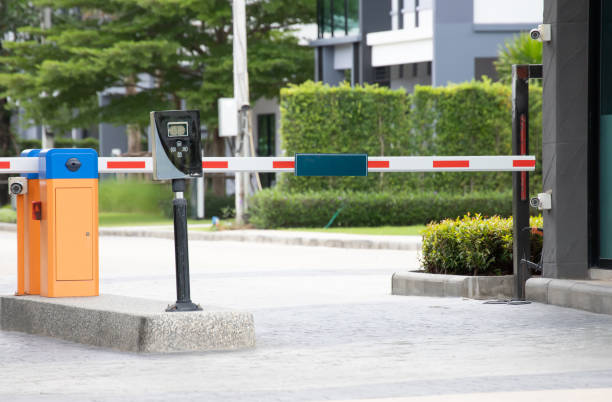istock car park barrier of village entrance, automatic entry  security system. 1173321776