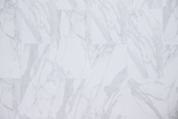 istock white marble tiles background and texture. white stone wall or floor. 1173321778