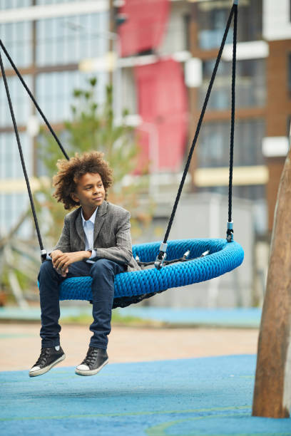 istock African boy playing on the playground 1173327718