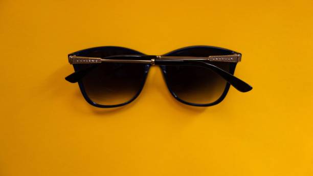 istock Sunglasses on Yellow Background. Summer Concept. Flat Design 1173327777