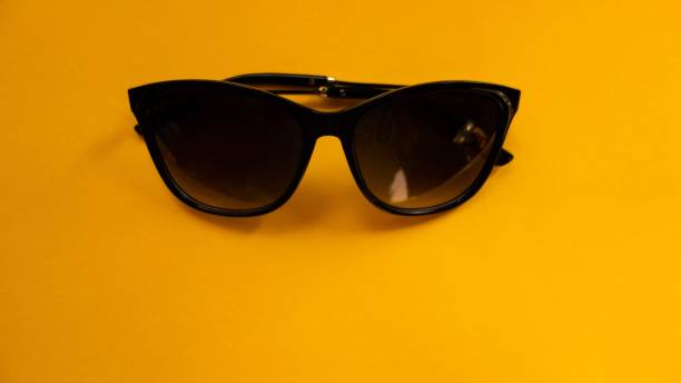 istock Sunglasses on Yellow Background. Summer Concept. Flat Design 1173327805