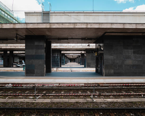 A front-view shot of an abstract railroad station.