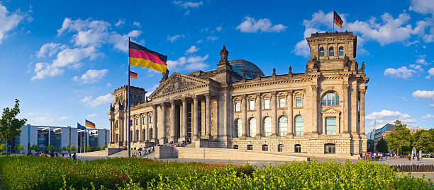 Berlin views The Reichstag Parliament building Berlin (1884 to 1894) bathed in warm evening sunlight. Perspective corrected stiched panorama detailed when viewed large. the reichstag stock pictures, royalty-free photos & images