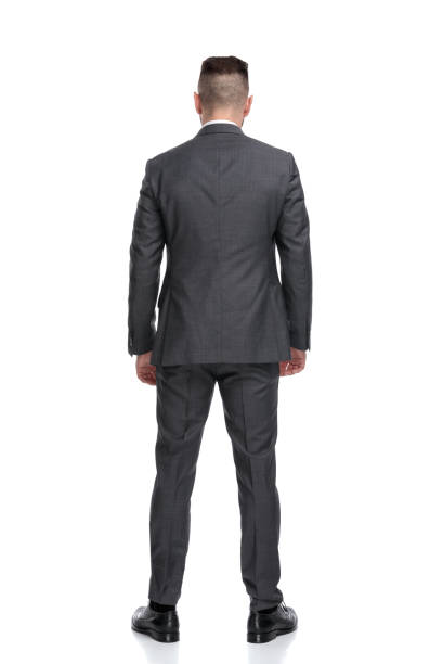 istock back view of a young businessman standing 1173332017
