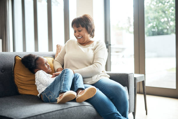 istock Grandma will do anything to keep her little angel happy 1173335583