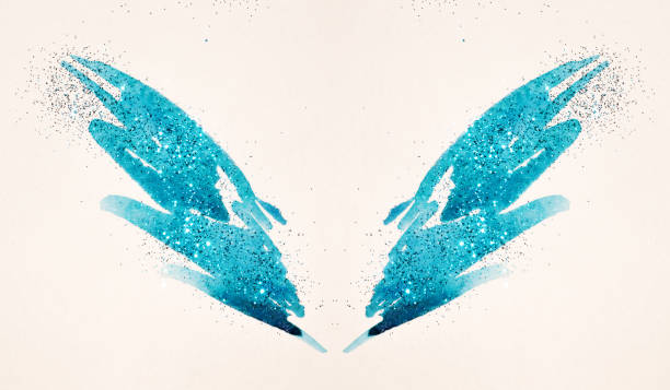 istock Blue glitter on abstract blue watercolor wings on white background 1173337102