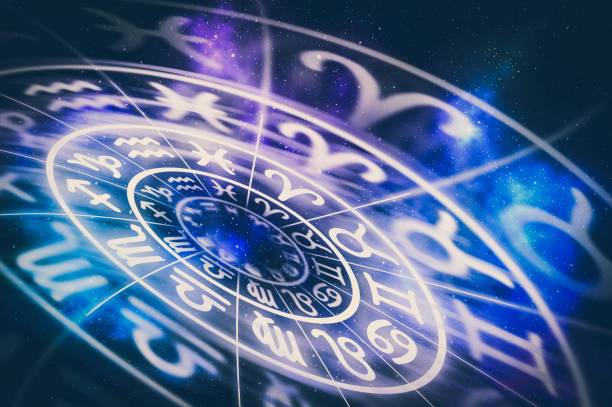 istock Zodiac signs inside of horoscope circle on universe background 1173337154