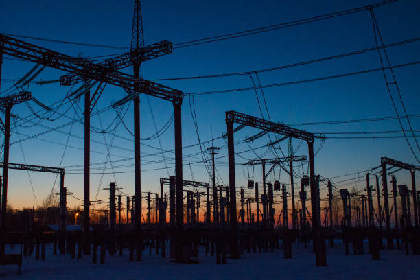 Electrical substation at night on long exposure shot Electrical substation at night on long exposure shot blackout photos stock pictures, royalty-free photos & images