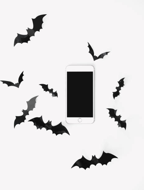 istock Halloween flat lay with mock-up and holidays decorations isolated on white. 1173339030