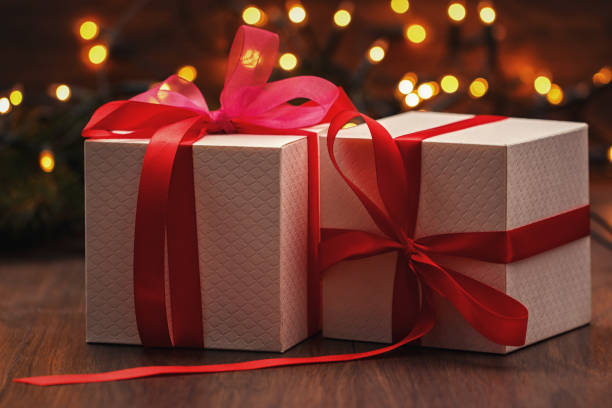 istock Christmas background with gift boxes and lights 1173340307