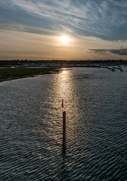 istock Sunset over marshland at Lymington in Hampshire 1173342312