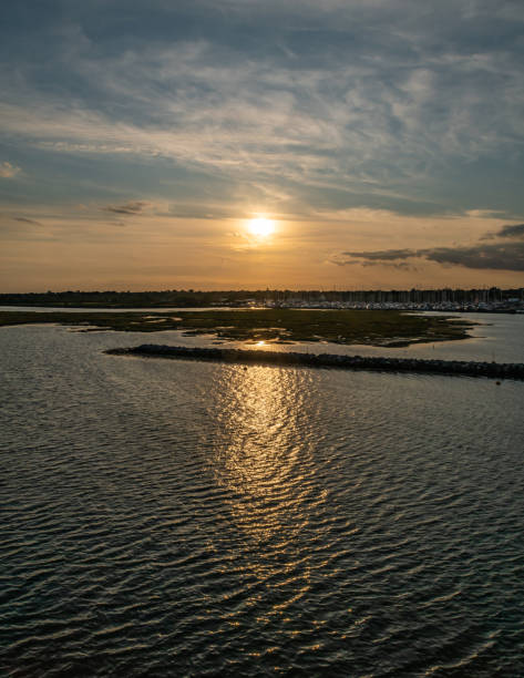 istock Sunset over marshland at Lymington in Hampshire 1173342313