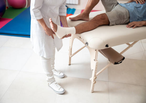 istock Female medic is using a bandage for the patient 1173342324