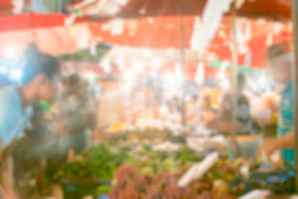 Blurred background of Traditional street foods in Kad Luang night market in Chiangmai province, Thailand. Blurred background of Traditional street foods in Kad Luang night market in Chiangmai province, Thailand. warorot stock pictures, royalty-free photos & images