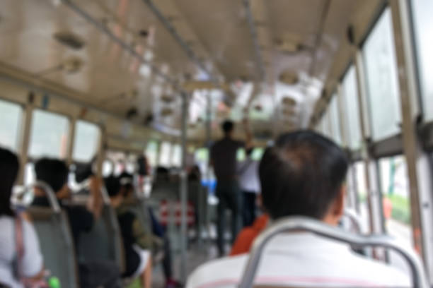 Blurred background of local fan bus with no air conditioning, the on road public transportation  in Bangkok Thailand stock photo