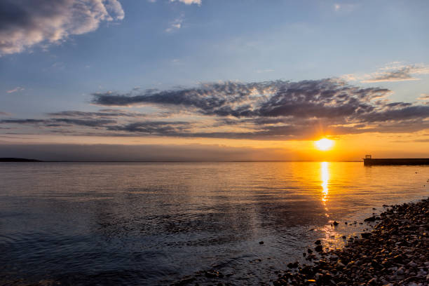 istock yellow sunset on the sea. 1173346036