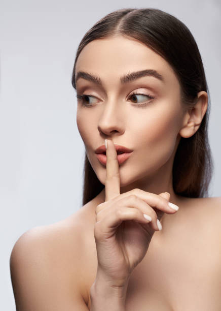 istock Calm young lady is posing against light gray background 1173346935