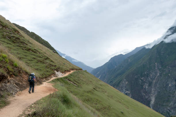 istock Young hiker man trekking with backpack in Peruvian Andes mountains, Peru, South America 1173347670
