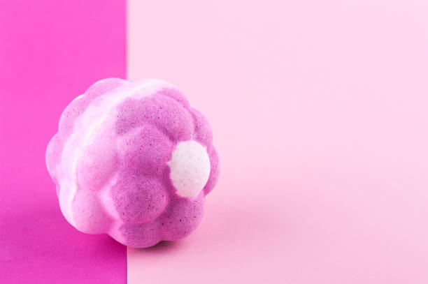 istock Aroma bath bomb on pink background 1173350304