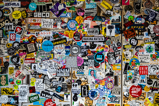 Tokyo, Japan - August 8, 2019: Sticker on the road stuck on the wall in Shinjuku ward, Tokyo
